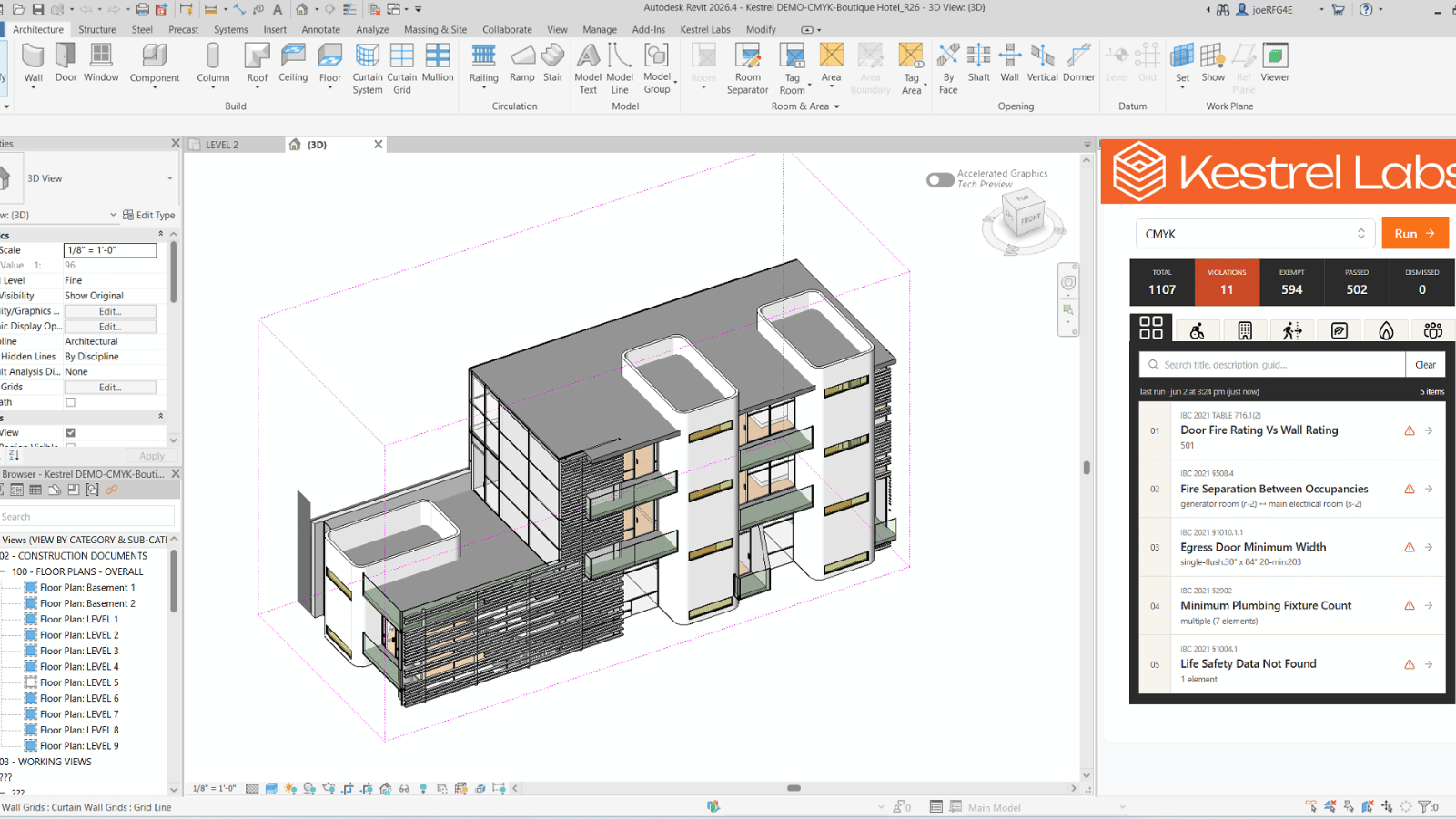 An architect reviewing building models with the Kestrel Compliance platform inside a design office.
